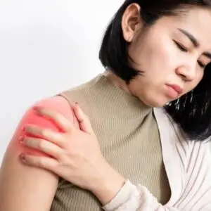 Person with limited shoulder range due to frozen shoulder